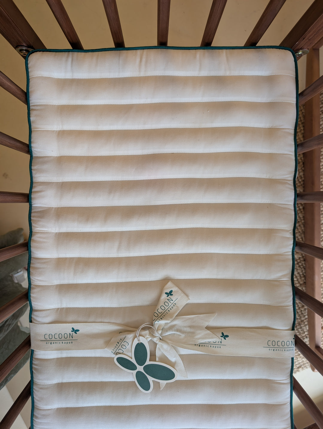 Vuggemadras i kapok og økologisk materiale - 40×90 cm